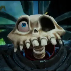 Un teschio con un occhio blu sporgente, parte di un personaggio del **medievil 2 remake**, con un'espressione buffa.