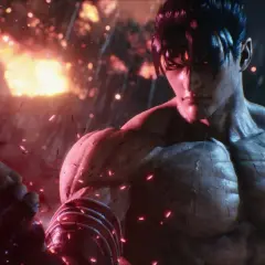 Jin Kazama pronto a combattere in Tekken 8 recensione. Sfondo infuocato e pioggia di scintille.