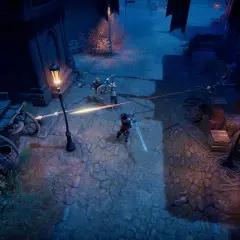 V Rising recensione: un cavaliere affronta nemici in un vicolo oscuro illuminato da lanterne.