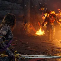 Una guerriera con spada affronta un demone infuocato, un'epica battaglia che anticipa il prossimo God of War.