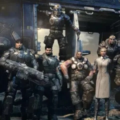 La squadra di Gears of War Reloaded, pronta all'azione davanti a un elicottero.