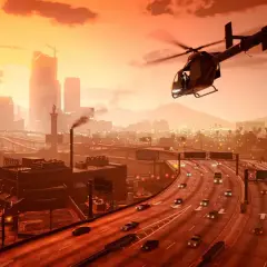 Elicottero sorvola Los Santos al tramonto, un'ottima ambientazione per usare trucchi GTA 5 Xbox Serie S e seminare il caos.