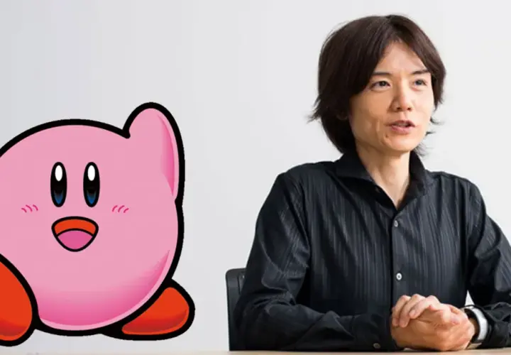 Masahiro Sakurai, chi ha creato Kirby, parla accanto al suo iconico personaggio rosa.