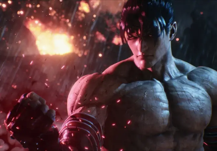 Jin Kazama pronto a combattere in Tekken 8 recensione. Sfondo infuocato e pioggia di scintille.
