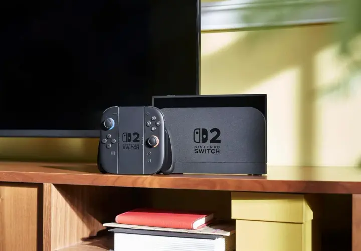 Un controller e la dock del Nintendo Switch, pronti per una sessione di gioco.