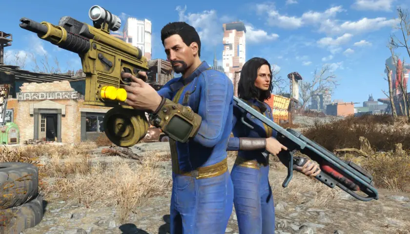 Coppia in tuta blu con armi post-apocalittiche, pronti per un **fallout 4 update**.