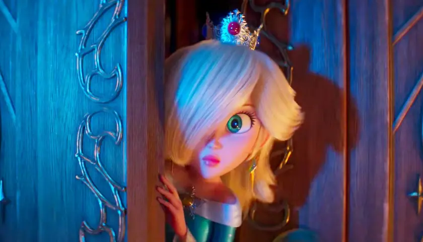 Rosalina, con la sua corona scintillante, spia da dietro una porta, pronta per nuove avventure in Super Mario Galaxy 3.
