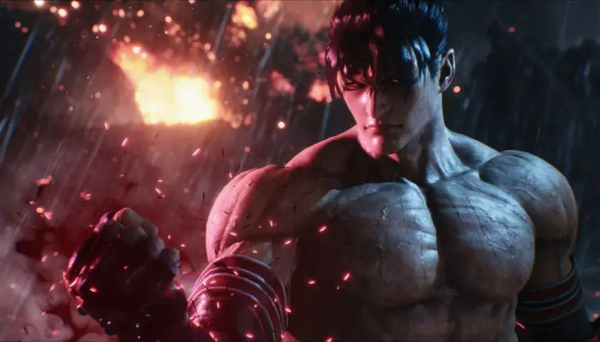Jin Kazama pronto a combattere in Tekken 8 recensione. Sfondo infuocato e pioggia di scintille.