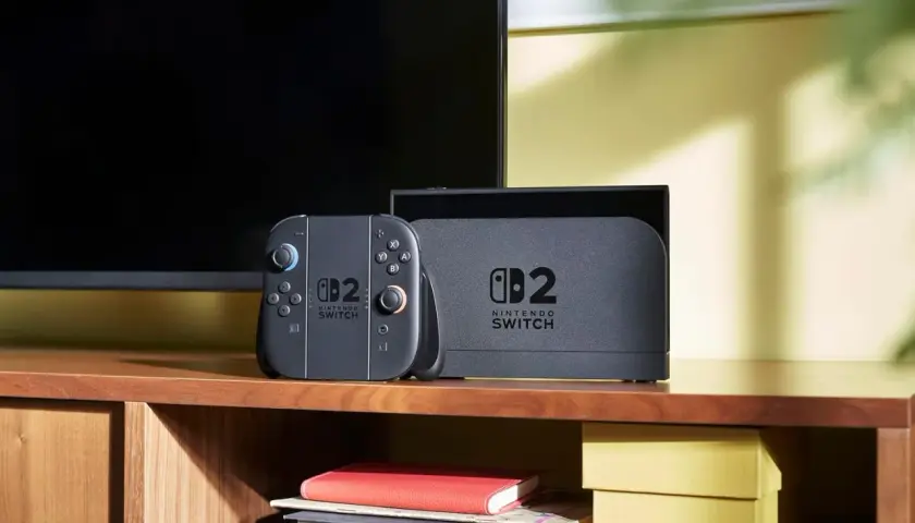 Un controller e la dock del Nintendo Switch, pronti per una sessione di gioco.