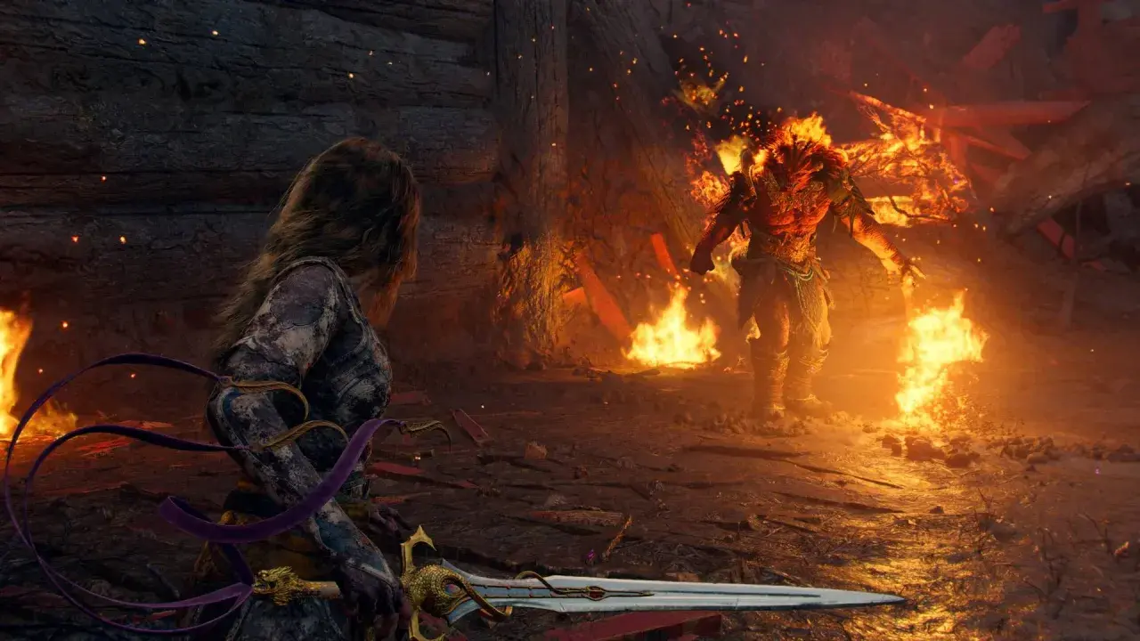 Una guerriera con spada affronta un demone infuocato, un'epica battaglia che anticipa il prossimo God of War.